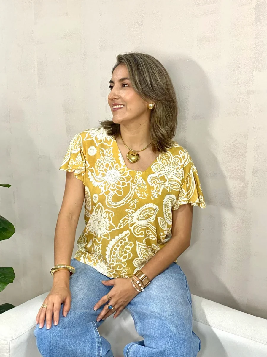 Blusa escote espalda manga con vuelos