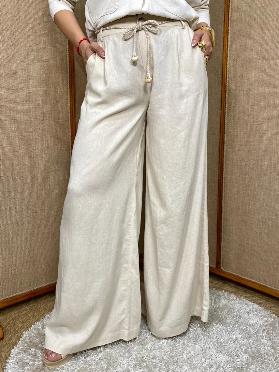 Pantalón palazzo con pinzas y bolsillos y elástico en pretina