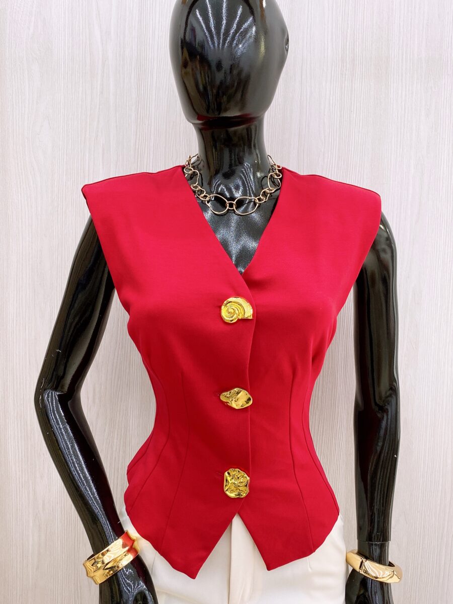 Blusa tipo chaleco con maxi botones dorados