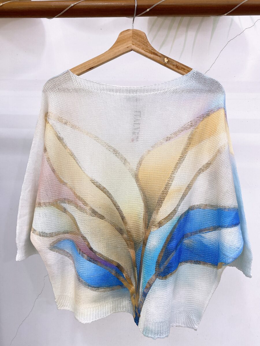 Sweater tejido de manga kimona detalles en foil