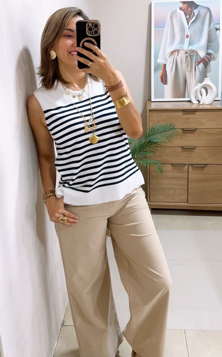 Blusa tejida cuello redondo manga sisa