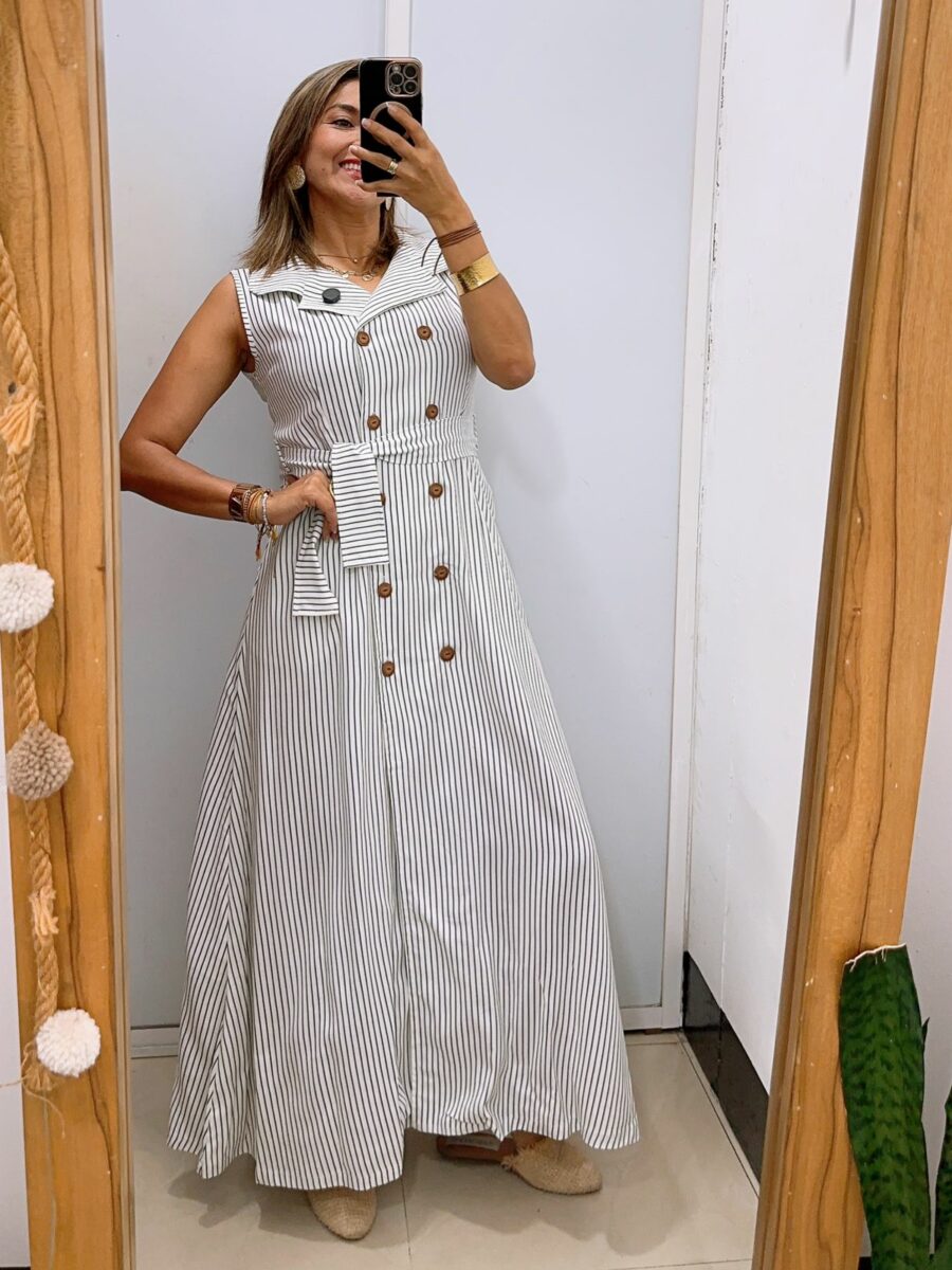 Vestido corte maxi estampado a rayas incluye cinto
